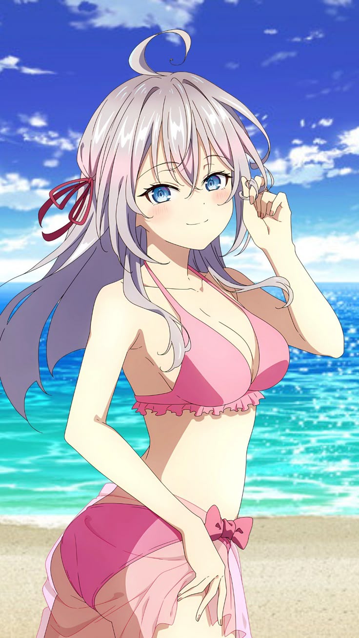 Alya at the beach in a pink swimsuit