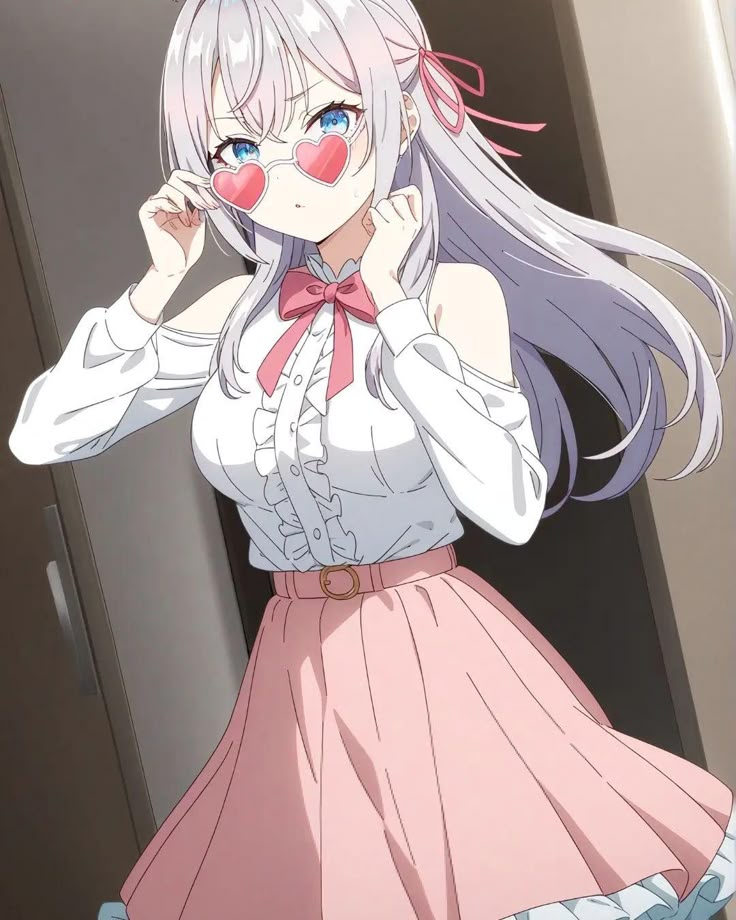 Alya in pink outfit with heart-shaped sunglasses